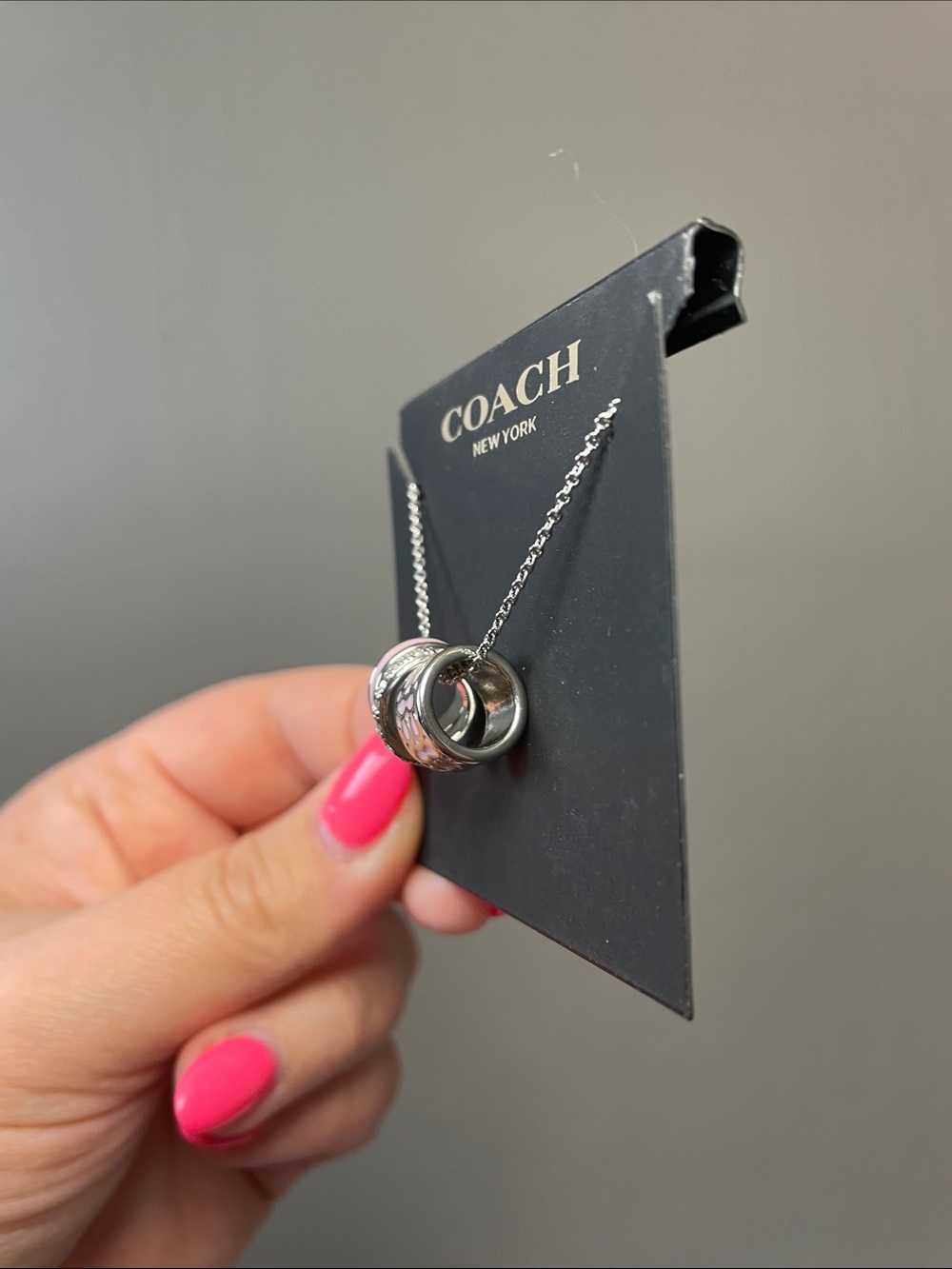 COACH Silver Necklace with Pink Enamel & Crystal Ring Charms $128 MSRP NWT - Picture 3 of 7